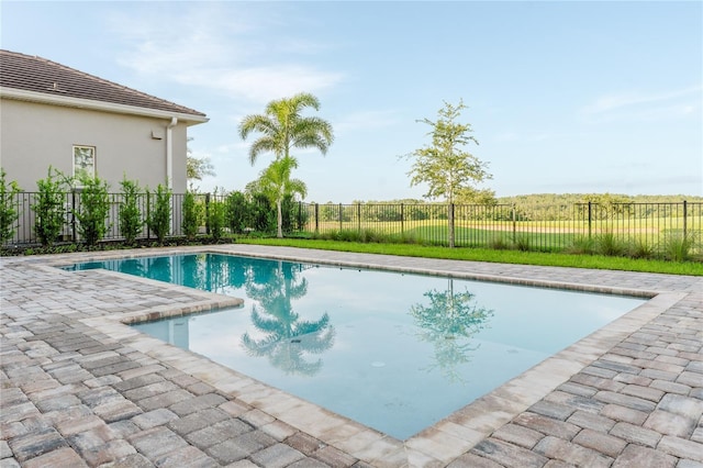 15942 Vetta Dr, Bella Collina, FL 34756 - view of swimming pool featuring a patio