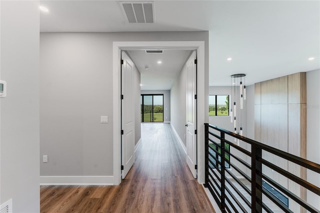 15942 Vetta Dr, Bella Collina, FL 34756 - hall featuring wood finished floors and recessed lighting