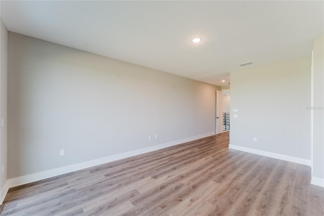 15942 Vetta Dr, Bella Collina, FL 34756 - spare room featuring light wood-style flooring and recessed lighting