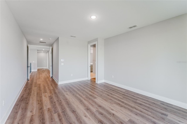 15942 Vetta Dr, Bella Collina, FL 34756 - unfurnished room featuring light wood-style flooring and recessed lighting