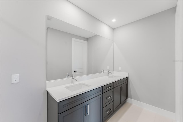 15942 Vetta Dr, Bella Collina, FL 34756 - bathroom featuring double vanity and tile patterned flooring