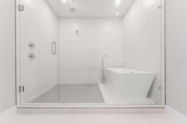 15942 Vetta Dr, Bella Collina, FL 34756 - full bath featuring a shower stall and a soaking tub