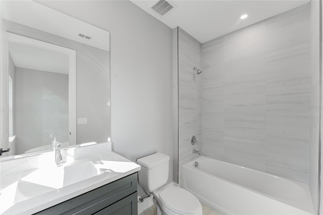 15942 Vetta Dr, Bella Collina, FL 34756 - bathroom featuring vanity, washtub / shower combination, and recessed lighting