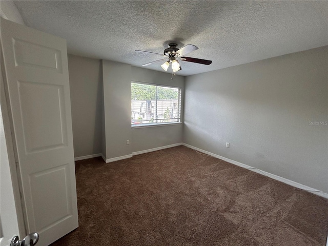 1922 Conway Rd Unit 1922, Orlando, FL 32812 - spare room with ceiling fan, dark colored carpet, and a textured ceiling