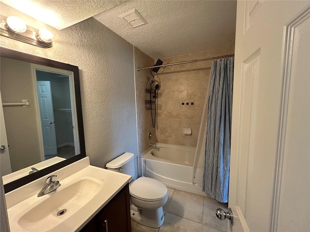 1922 Conway Rd Unit 1922, Orlando, FL 32812 - full bath with a textured wall, a textured ceiling, tile patterned flooring, vanity, and shower / tub combo with curtain