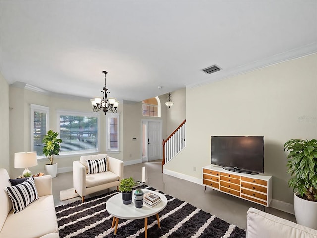 11356 Callaway Pond Dr, Riverview, FL 33579 - living room with a chandelier, stairs, and ornamental molding