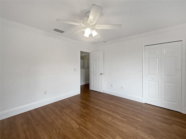 11356 Callaway Pond Dr, Riverview, FL 33579 - unfurnished bedroom with wood finished floors, ornamental molding, a closet, and ceiling fan