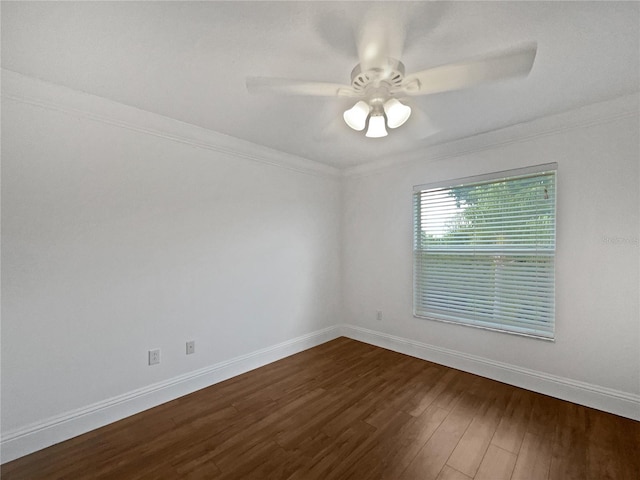 11356 Callaway Pond Dr, Riverview, FL 33579 - spare room featuring dark wood-type flooring, ornamental molding, and a ceiling fan
