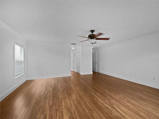 11356 Callaway Pond Dr, Riverview, FL 33579 - unfurnished living room featuring wood finished floors, ceiling fan, and ornamental molding