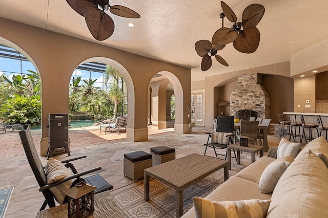 9400 Laws Rd, Clermont, FL 34714 - view of patio with an outdoor living space, a ceiling fan, and an outdoor pool