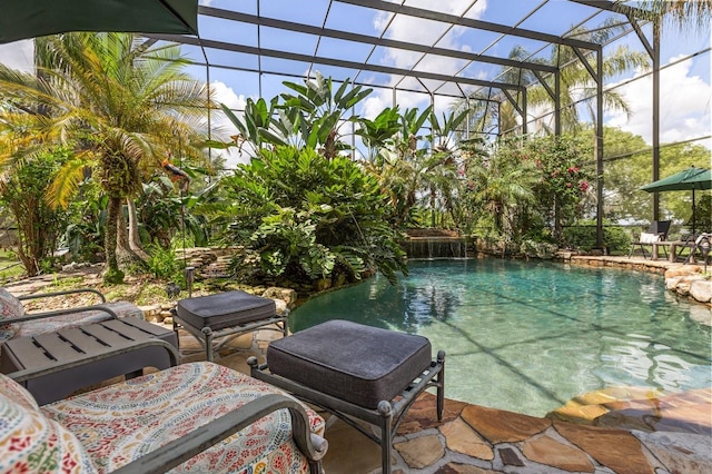 9400 Laws Rd, Clermont, FL 34714 - outdoor pool featuring glass enclosure and a patio area