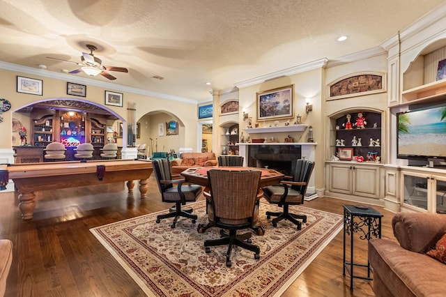 9400 Laws Rd, Clermont, FL 34714 - dining room featuring ceiling fan, ornamental molding, built in features, a textured ceiling, and pool table