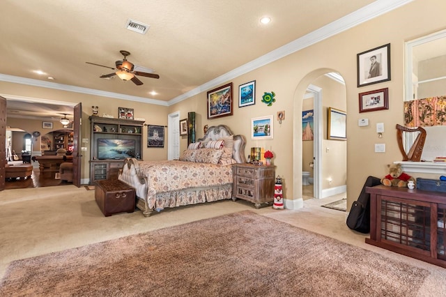 9400 Laws Rd, Clermont, FL 34714 - carpeted bedroom with arched walkways, ornamental molding, recessed lighting, and ceiling fan