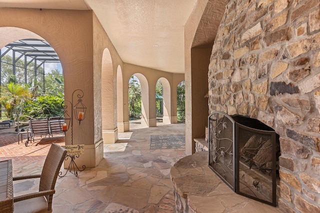 9400 Laws Rd, Clermont, FL 34714 - view of patio / terrace with an outdoor stone fireplace