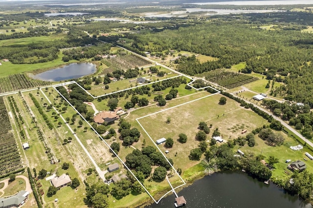 9400 Laws Rd, Clermont, FL 34714 - aerial view of property's location featuring rural landscape, property boundaries highlighted, and a nearby body of water