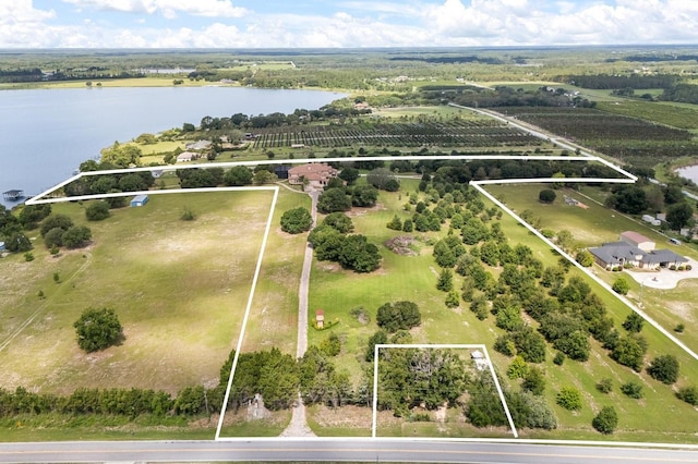 9400 Laws Rd, Clermont, FL 34714 - view of rural area with property boundaries highlighted, a nearby body of water, and extensive farmland