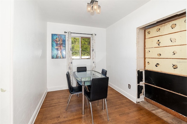131 N Central Ave, Apopka, FL 32703 - dining space featuring wood finished floors and a chandelier