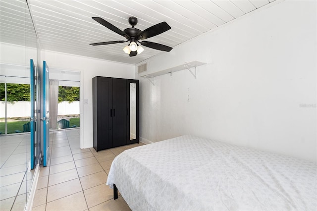 131 N Central Ave, Apopka, FL 32703 - bedroom with light tile patterned flooring and ceiling fan
