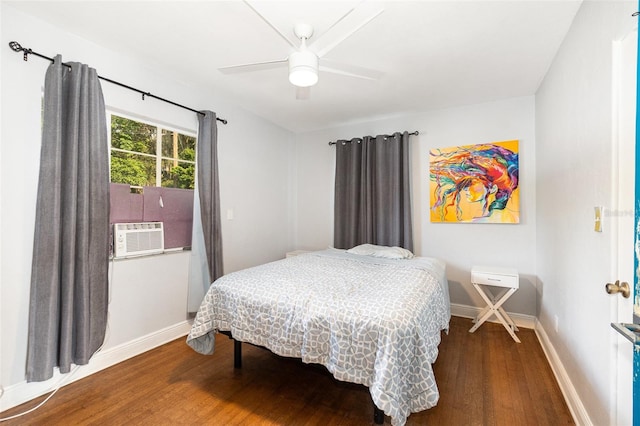 131 N Central Ave, Apopka, FL 32703 - bedroom with wood finished floors, cooling unit, and a ceiling fan