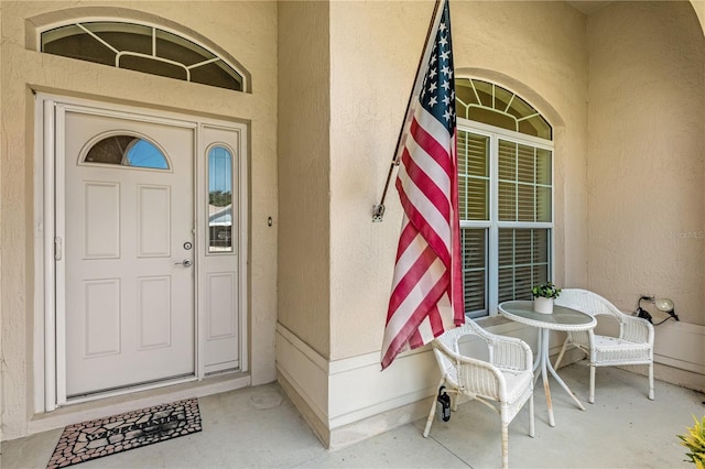 1254 Spartanburg Way, The Villages, FL 32162 - property entrance featuring stucco siding and covered porch