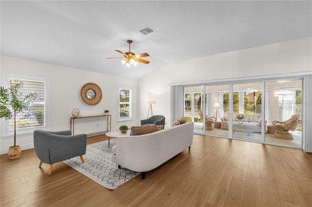1254 Spartanburg Way, The Villages, FL 32162 - living area featuring hardwood / wood-style floors, a ceiling fan, and lofted ceiling