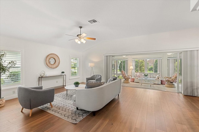 1254 Spartanburg Way, The Villages, FL 32162 - living area with lofted ceiling, wood-type flooring, and ceiling fan