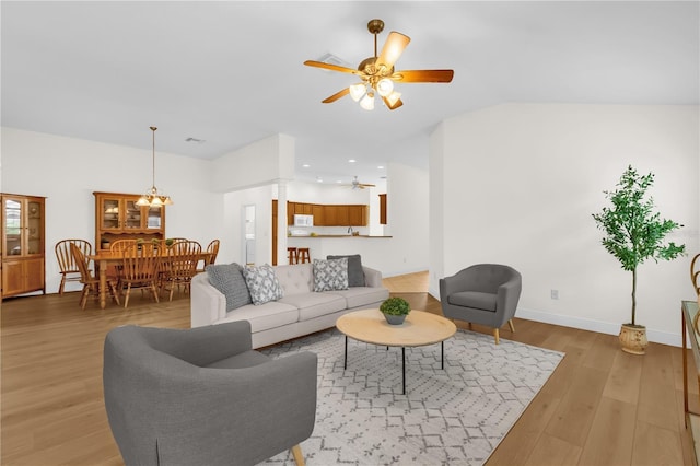 1254 Spartanburg Way, The Villages, FL 32162 - living area with ceiling fan and light wood-style flooring