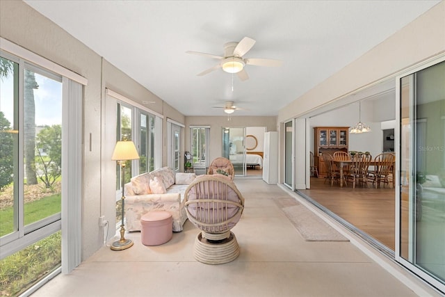 1254 Spartanburg Way, The Villages, FL 32162 - sunroom featuring healthy amount of natural light and a ceiling fan