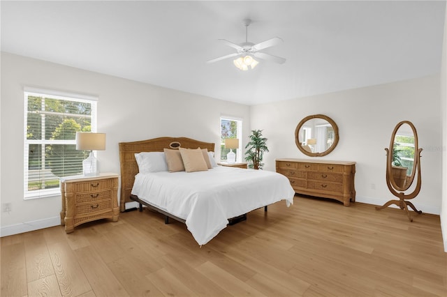 1254 Spartanburg Way, The Villages, FL 32162 - bedroom with light wood-type flooring and a ceiling fan