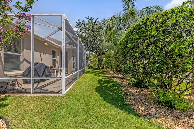 1254 Spartanburg Way, The Villages, FL 32162 - view of grassy yard featuring a patio and a lanai