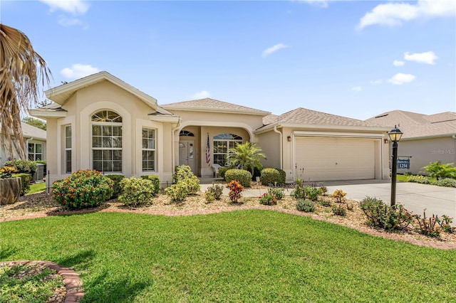 1254 Spartanburg Way, The Villages, FL 32162 - view of front of house with stucco siding, concrete driveway, a garage, and a front yard