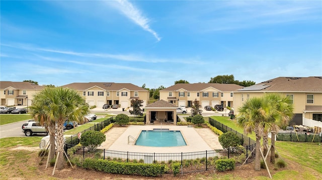 200 Feltrim Reserve Blvd, Davenport, FL 33837 - community pool featuring a residential view and a patio