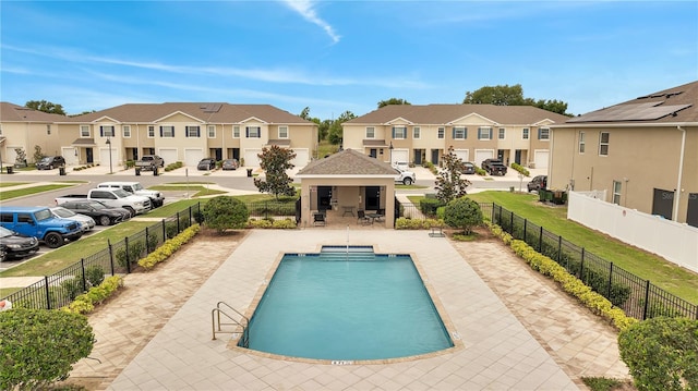 200 Feltrim Reserve Blvd, Davenport, FL 33837 - community pool featuring a residential view and a patio area