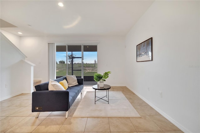 200 Feltrim Reserve Blvd, Davenport, FL 33837 - living area featuring light tile patterned flooring and recessed lighting