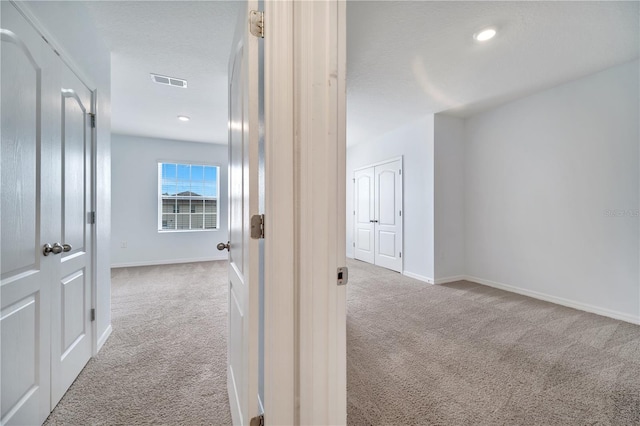 200 Feltrim Reserve Blvd, Davenport, FL 33837 - hallway with carpet flooring and recessed lighting