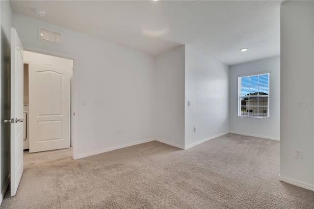 200 Feltrim Reserve Blvd, Davenport, FL 33837 - empty room featuring light carpet, a smoke detector, and recessed lighting