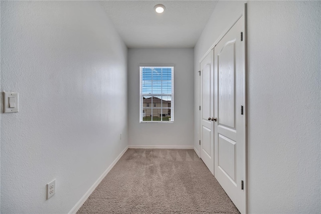 200 Feltrim Reserve Blvd, Davenport, FL 33837 - corridor featuring light colored carpet and baseboards