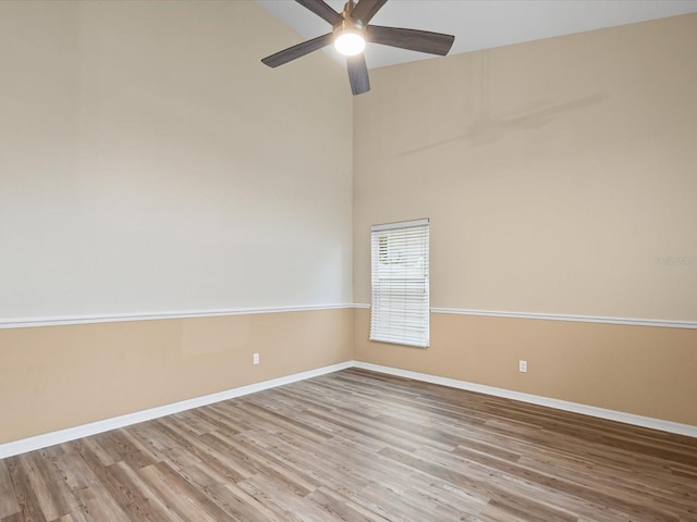 14322 Pine Cone Trl, Clermont, FL 34711 - unfurnished room with ceiling fan and wood finished floors