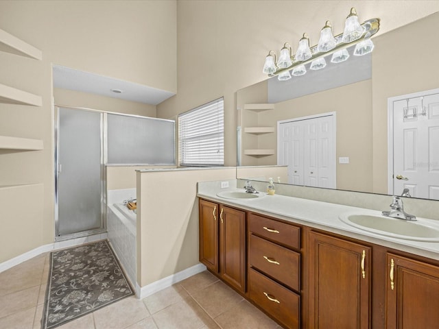 14322 Pine Cone Trl, Clermont, FL 34711 - full bath featuring a towering ceiling, double vanity, a garden tub, a stall shower, and tile patterned floors