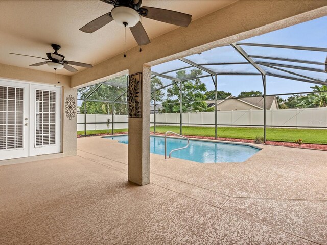 14322 Pine Cone Trl, Clermont, FL 34711 - view of swimming pool with french doors, a patio, ceiling fan, and a lanai