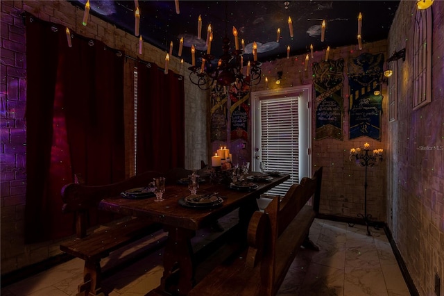 2041 Lacie Jo Ln, Kissimmee, FL 34743 - dining space with marble look tiles and a chandelier