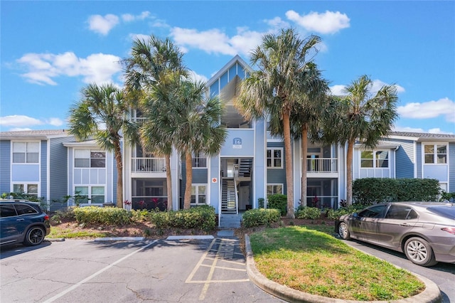 711 Sugar Bay Way Unit 109, Lake Mary, FL 32746 - view of building exterior featuring uncovered parking