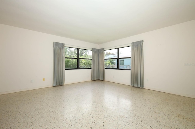 2417 Bayfront Pkwy, Orlando, FL 32806 - empty room with speckle patterned floor