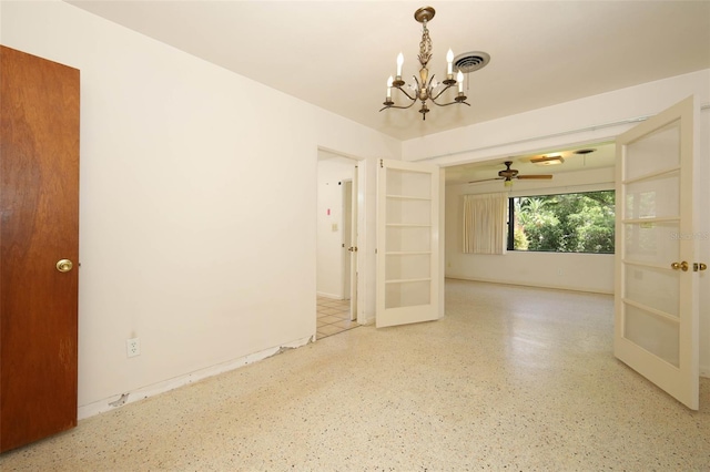 2417 Bayfront Pkwy, Orlando, FL 32806 - unfurnished room with a chandelier, french doors, ceiling fan, and speckled floor