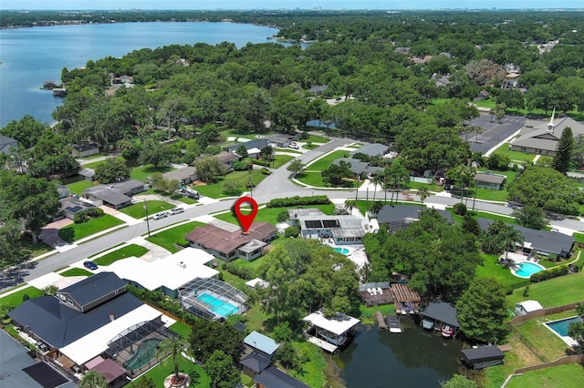 2417 Bayfront Pkwy, Orlando, FL 32806 - aerial overview of property's location with a large body of water and nearby suburban area