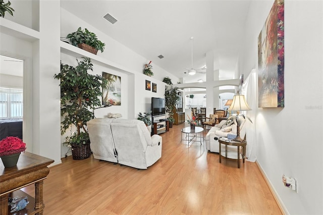 1752 Challenger Ave, Davenport, FL 33897 - living room with ceiling fan, light wood-style flooring, and vaulted ceiling