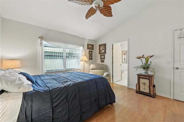 1752 Challenger Ave, Davenport, FL 33897 - bedroom with vaulted ceiling, light wood-style floors, ensuite bath, and a ceiling fan