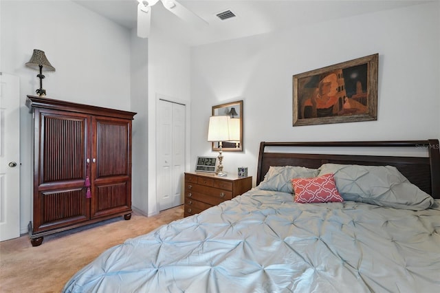 1752 Challenger Ave, Davenport, FL 33897 - bedroom featuring light colored carpet, a closet, and a ceiling fan