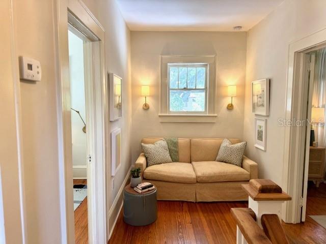 501 Richmond St, Orlando, FL 32806 - sitting room with wood finished floors