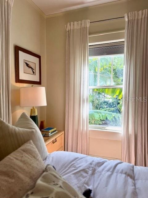 501 Richmond St, Orlando, FL 32806 - bedroom featuring ornamental molding and multiple windows